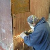 Russell removing a bank vault.